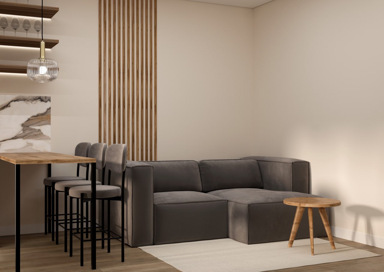 Деталь интерьера с теплыми материалами и зонированием.